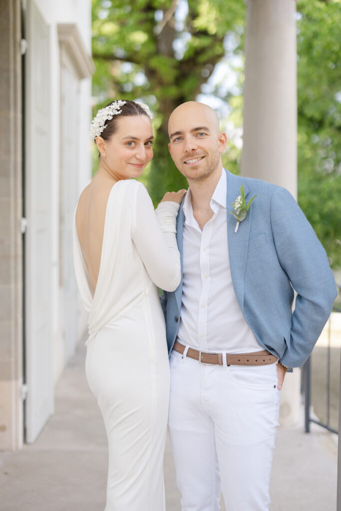 Happy bride and groom portrait outside Mairie de Lancy civil wedding Geneva