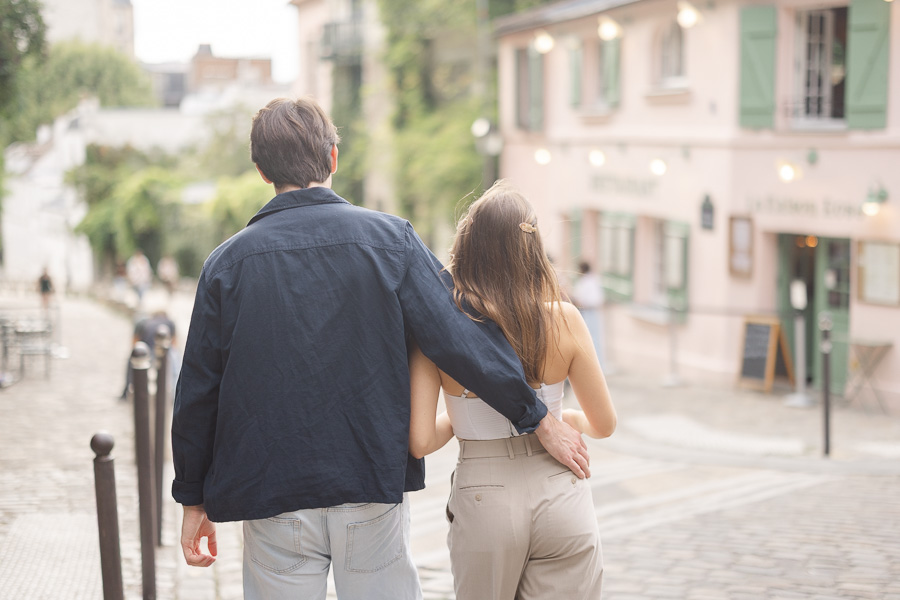 Couple in front of La Maison Rose during couple photo session Montmartre Paris