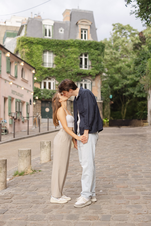 Couple in front of La Maison Rose during couple photo session Montmartre Paris