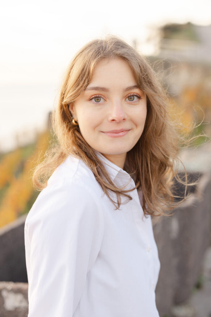 Natural portrait of bride smiling during engagement session in Lavaux, Lake Geneva