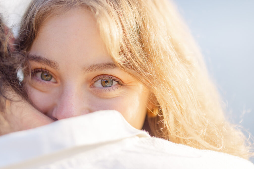 Close-up portrait of bride's eyes during golden hour engagement session in Lavaux