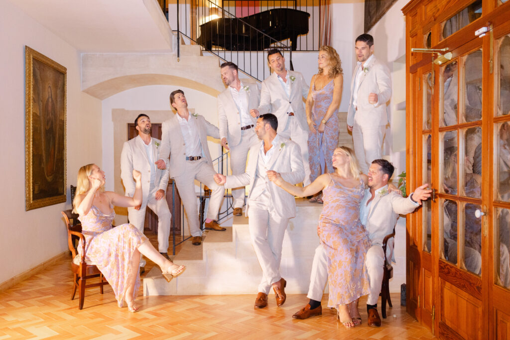 Wedding party dancing indoors on rainy wedding day Son Donblon Mallorca